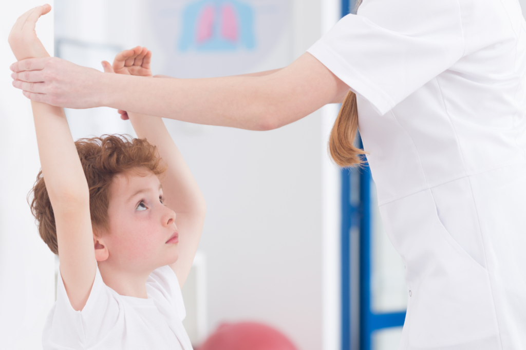 A child being examined during a sports physical in Texas.